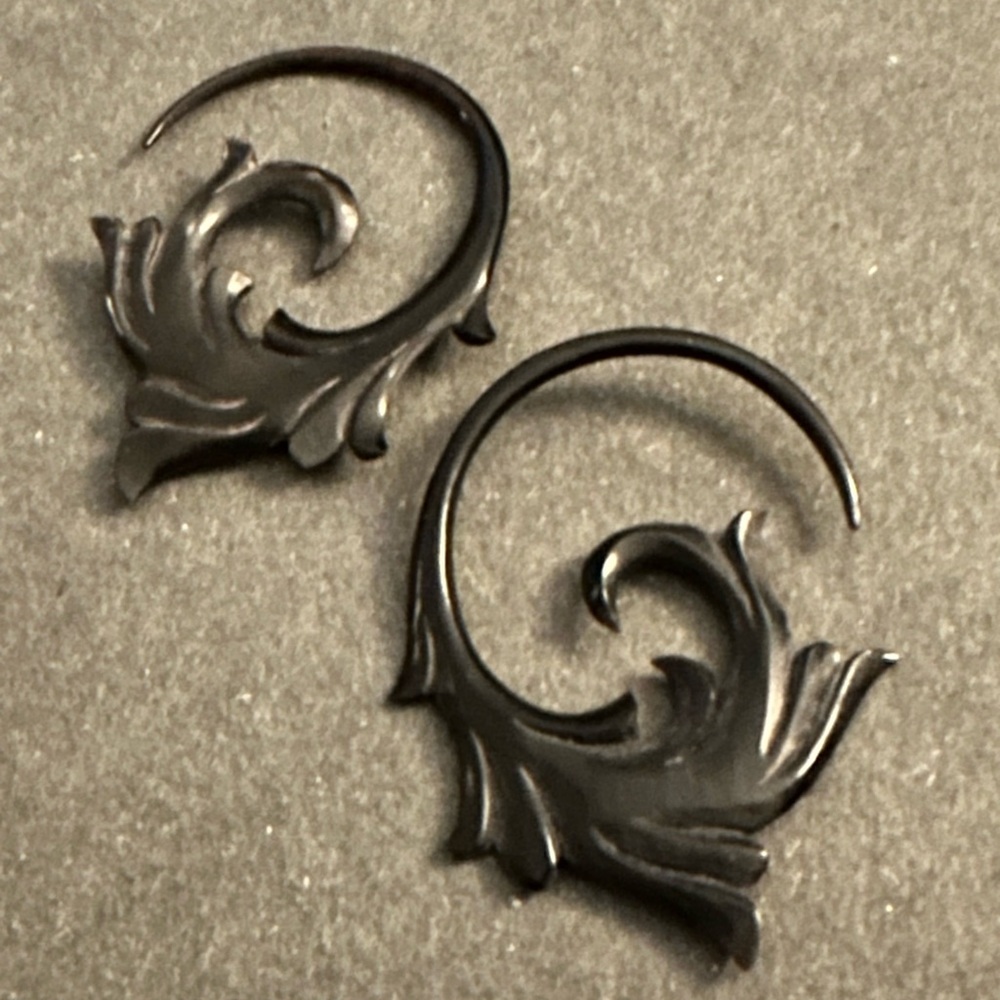 Carved black gauged hoops